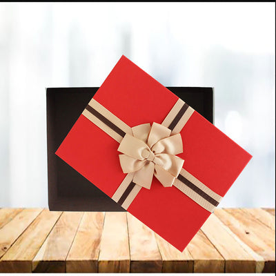 Red lid Gift Boxes made from strong, rigid, longlisting cardboard Material. Box has elegant cream design with a chocolate brown interior, beautifully finished with a textured lid and a two tone brown ribbon bow. No assembling required.